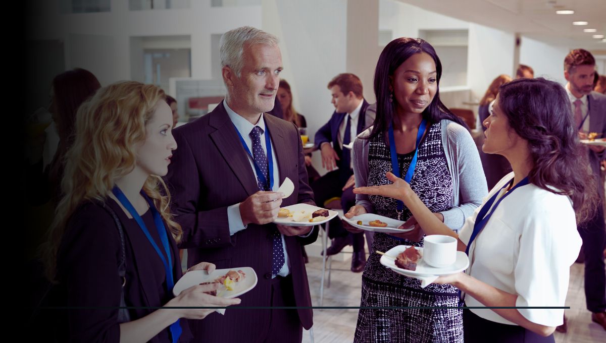 people at a networking event colaborating